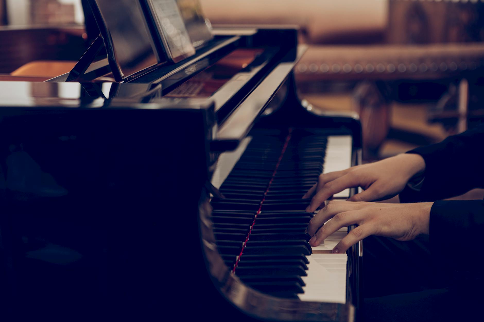 elegant piano performance with hands on keys